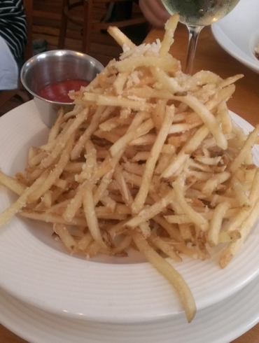 They neglect to tell you that they bring you a mountain-sized portion of fries.